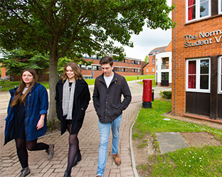 Students walking outside a UCA hall of residence